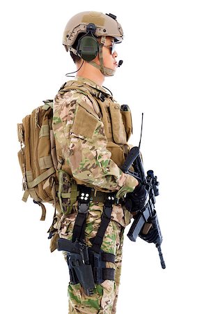 simsearch:400-07676882,k - Soldier with rifle or sniper standing on a white background Fotografie stock - Microstock e Abbonamento, Codice: 400-07716038