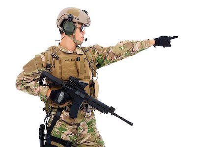 simsearch:400-07676882,k - Soldier holding rifle or sniper and directing Fotografie stock - Microstock e Abbonamento, Codice: 400-07716043