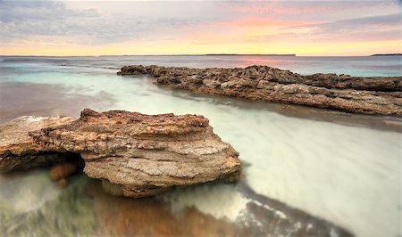 simsearch:400-07667033,k - Pastel colours of a surreal sunrise at Hyams Beach at Jervis Bay, Australia.  Long exposure Stock Photo - Budget Royalty-Free & Subscription, Code: 400-07716623