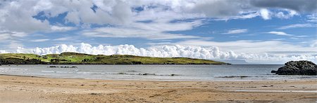 Fintra beach is a beautiful sandy beach just a couple of kilometers outside the fishing port of Killybegs. Stunning views of both the beach and Donegal Bay as far as Benbulben mountain in County Sligo Stockbilder - Microstock & Abonnement, Bildnummer: 400-07716791