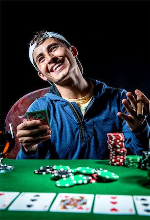 Cheerful poker player Stock Photo - Budget Royalty-Free & Subscription, Code: 400-07716897