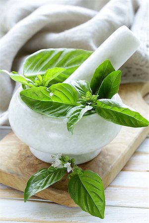 simsearch:400-04348087,k - fresh green basil leaves in a marble mortar Stock Photo - Budget Royalty-Free & Subscription, Code: 400-07716994