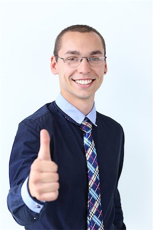 simsearch:400-07680948,k - Office, employee. Successful, young man at work Stock Photo - Budget Royalty-Free & Subscription, Code: 400-07717388