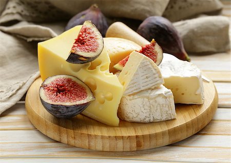 simsearch:400-05682309,k - cheeseboard with maasdam, camembert, cheddar cheese and figs Stock Photo - Budget Royalty-Free & Subscription, Code: 400-07717645