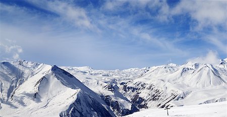 simsearch:696-03398004,k - Panorama of winter snowy mountains at nice day. Caucasus Mountains, Georgia. Ski resort, Gudauri. Foto de stock - Royalty-Free Super Valor e Assinatura, Número: 400-07718010