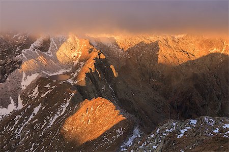 simsearch:400-07309307,k - sunrise in Caltun lake. Fagaras Mountains, Romania Stockbilder - Microstock & Abonnement, Bildnummer: 400-07718056