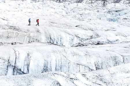 simsearch:400-04126574,k - Two people trekking on ice Vatnajokull glacier, iceland Fotografie stock - Microstock e Abbonamento, Codice: 400-07718752