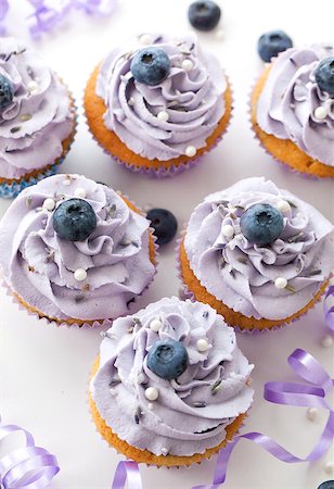fruit birthday cake photo - Tasty blueberry and lavender cupcakes on white background Stock Photo - Budget Royalty-Free & Subscription, Code: 400-07719830