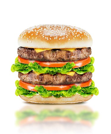 simsearch:400-07817174,k - Delicious Big burger with beef, tomato, cheese and lettuce on white background with clipping path. Foto de stock - Super Valor sin royalties y Suscripción, Código: 400-07712597