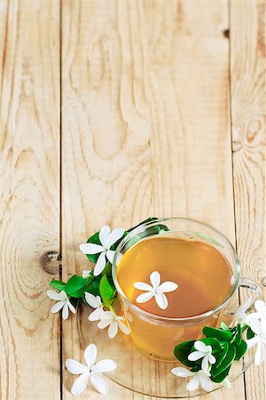 Green tea with jasmine blossom. Copy space background. Stock Photo - Budget Royalty-Free & Subscription, Code: 400-07713443