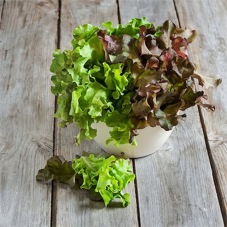 simsearch:400-06485512,k - Green salad lettuce on old wooden table. Selective focus. Stock Photo - Budget Royalty-Free & Subscription, Code: 400-07713451