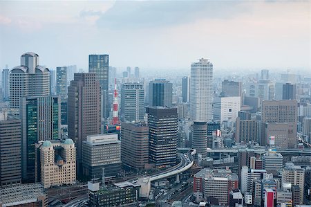 stockarch (artist) - Osaka city skyline from the Umeda Sky Building on a misty day showing the modern architecture and skyscrapers in the CBD area with flyovers and infrastructure Stock Photo - Budget Royalty-Free & Subscription, Code: 400-07724143