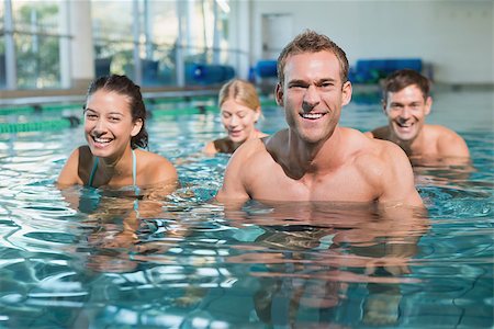 simsearch:400-07724709,k - Fitness class using underwater exercise bikes in swimming pool at the leisure centre Stock Photo - Budget Royalty-Free & Subscription, Code: 400-07724685