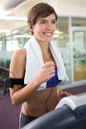 simsearch:400-07725931,k - Fit brunette running on the treadmill at the gym Photographie de stock - Aubaine LD & Abonnement, Code: 400-07725758