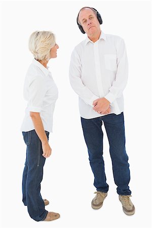 simsearch:400-07726578,k - Annoyed woman being ignored by her partner on white background Fotografie stock - Microstock e Abbonamento, Codice: 400-07726405