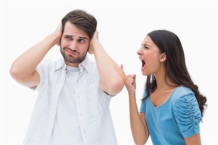 Angry brunette shouting at boyfriend on white background Stock Photo - Budget Royalty-Free & Subscription, Code: 400-07726725