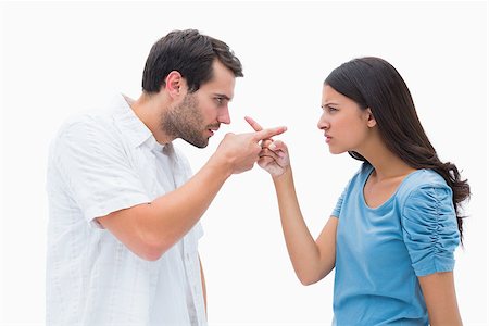 Angry couple pointing at each other on white background Stock Photo - Budget Royalty-Free & Subscription, Code: 400-07726720