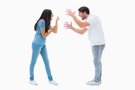 Angry couple shouting at each other on white background Foto de stock - Super Valor sin royalties y Suscripción, Código: 400-07726737