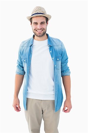 Handsome hipster smiling at camera on white background Stockbilder - Microstock & Abonnement, Bildnummer: 400-07726819