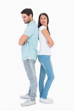 simsearch:400-07726578,k - Unhappy couple not speaking to each other on white background Fotografie stock - Microstock e Abbonamento, Codice: 400-07726895