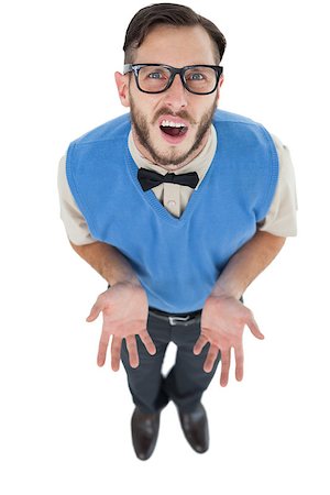 shoulder shrug - Geeky hipster looking confused at camera on white background Stock Photo - Budget Royalty-Free & Subscription, Code: 400-07727026
