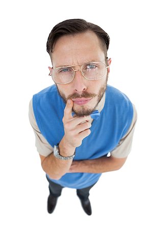 simsearch:400-07778671,k - Geeky hipster looking at camera on white background Fotografie stock - Microstock e Abbonamento, Codice: 400-07727030