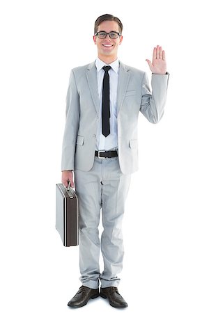 Handsome businessman waving at camera on white background Stock Photo - Budget Royalty-Free & Subscription, Code: 400-07727092