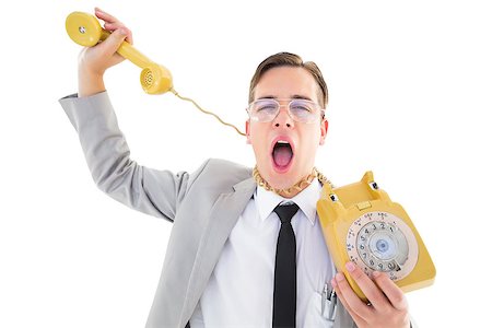 Geeky businessman being strangled by phone cord on white background Stock Photo - Budget Royalty-Free & Subscription, Code: 400-07727108