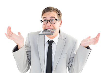 someone shrugging their shoulders - Geeky shrugging businessman biting calculator on white background Stock Photo - Budget Royalty-Free & Subscription, Code: 400-07727119