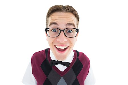 reading glasses top view - Smiling geeky hipster looking at camera on white background Stock Photo - Budget Royalty-Free & Subscription, Code: 400-07727224