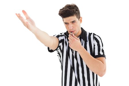 Stern referee blowing his whistle on white background Stock Photo - Budget Royalty-Free & Subscription, Code: 400-07727893