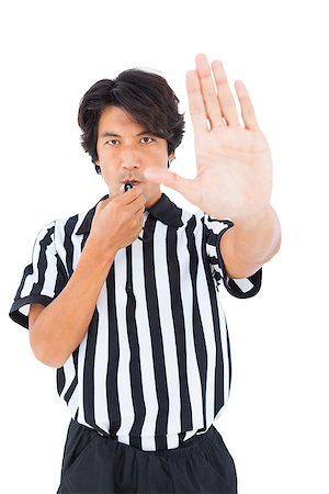 simsearch:622-08007327,k - Stern referee showing stop sign with hand on white background Photographie de stock - Aubaine LD & Abonnement, Code: 400-07727996