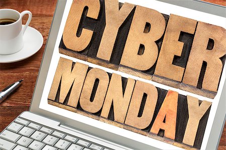 simsearch:400-08332628,k - Cyber Monday - online shopping and marketing concept -  text in letterpress wood type blocks on a laptop with a cup of coffee Foto de stock - Super Valor sin royalties y Suscripción, Código: 400-07729354
