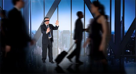 simsearch:400-07665756,k - Mature businessman in a blindfold against room with large window looking on city Stock Photo - Budget Royalty-Free & Subscription, Code: 400-07720797