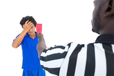 simsearch:622-08007327,k - Serious referee showing red card to player on white background Photographie de stock - Aubaine LD & Abonnement, Code: 400-07721755