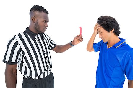 simsearch:622-08007327,k - Serious referee showing red card to player on white background Photographie de stock - Aubaine LD & Abonnement, Code: 400-07721753