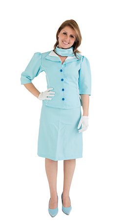 simsearch:400-07752842,k - Portrait of a charming stewardess dressed in blue uniform over white background Stock Photo - Budget Royalty-Free & Subscription, Code: 400-07722694
