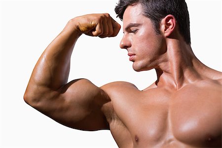 simsearch:400-07723048,k - Close-up of a shirtless muscular man flexing muscles over white background Foto de stock - Royalty-Free Super Valor e Assinatura, Número: 400-07723232