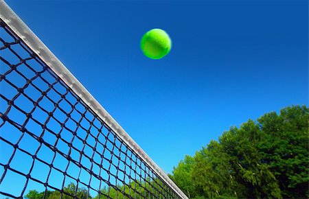 Tennis ball on net´s edge Stock Photo - Budget Royalty-Free & Subscription, Code: 400-07745613