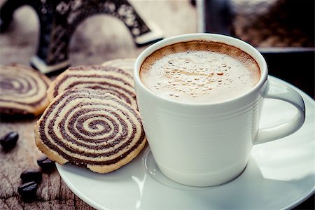 Cup of espresso and biscotti on table Stockbilder - Microstock & Abonnement, Bildnummer: 400-07745686