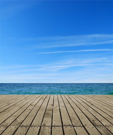 studio023 (artist) - wooden pier overlooking the sea, blue sky and waves Stockbilder - Microstock & Abonnement, Bildnummer: 400-07745693