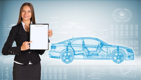 simsearch:400-08158930,k - Businesswoman holding paper holder. High-tech wire-frame car and graphs as backdrop Stock Photo - Budget Royalty-Free & Subscription, Code: 400-07746260