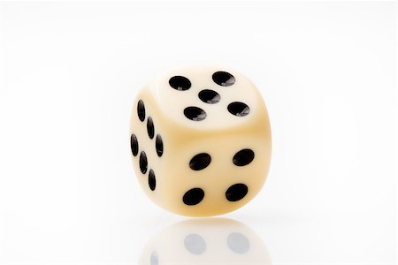 closeup of  white dice on white table Stockbilder - Microstock & Abonnement, Bildnummer: 400-07746402