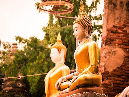 simsearch:400-07749657,k - Seated buddha in Wat Phu Khao Thong temple. Ayutthaya,Thailand. Photographie de stock - Aubaine LD & Abonnement, Code: 400-07746467