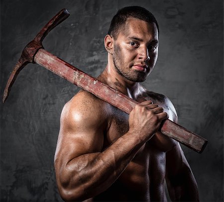 power ax - Muscular man holding pickaxe Stock Photo - Budget Royalty-Free & Subscription, Code: 400-07747000