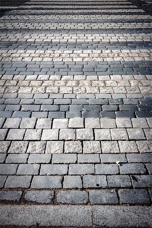 simsearch:400-04932502,k - Pedestrian crossing on cobblestone road pavement Photographie de stock - Aubaine LD & Abonnement, Code: 400-07747134