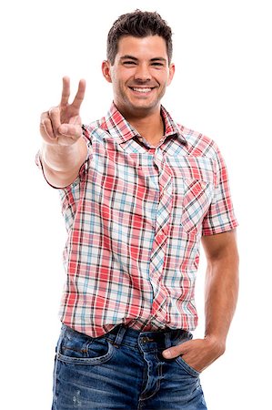 peace fingers - Handsome latin man smiling and showing two fingers, isolated over a white background Stock Photo - Budget Royalty-Free & Subscription, Code: 400-07747967