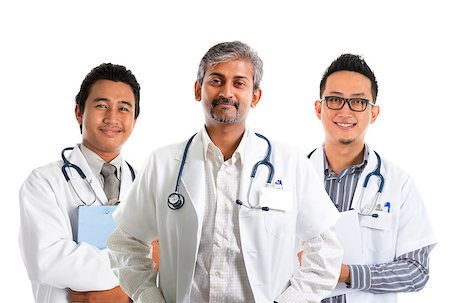 Multiracial doctors / diverse medical team standing isolated on white background Stock Photo - Budget Royalty-Free & Subscription, Code: 400-07748780