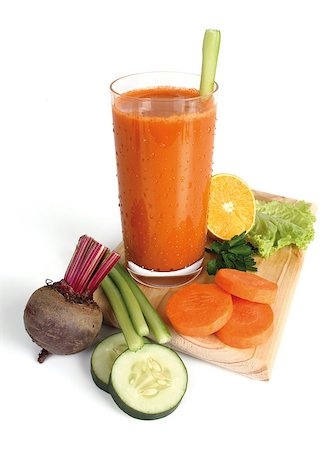 glass with carrot juice on white background Photographie de stock - Aubaine LD & Abonnement, Code: 400-07748901