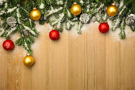 Christmas background with fresh firtree and  baubles on wood with bright snow Stock Photo - Budget Royalty-Free & Subscription, Code: 400-07749305
